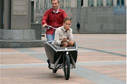 Delegates test-riding a cargo bike at the morning exhibition 